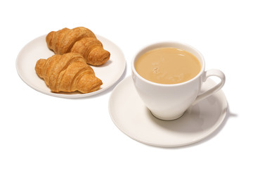 Coffee with milk and croissants