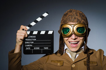 Funny pilot with goggles and helmet