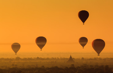 Balloon over plain of Bagan in misty morning, Myanmar