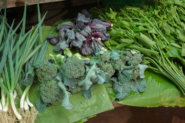Fresh vegetables isolated on banana leaf green.