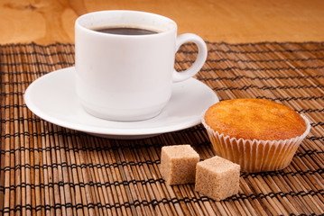 espresso coffee in a white china cup over wood surface