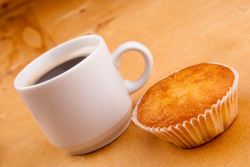 espresso coffee in a white china cup over wood surface