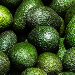 Avocado background. Fresh green avocado on a market stail. Food © nataliazakharova
