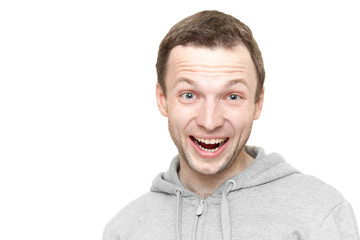 Obraz premium Laughing Caucasian man in sports jacket with hood. Portrait isol