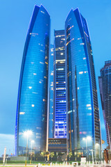 Fototapeta premium Skyscrapers of Abu Dhabi at dusk, United Arab Emirates