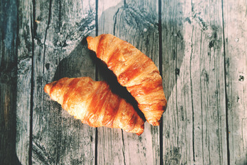 French croissants on a wooden table