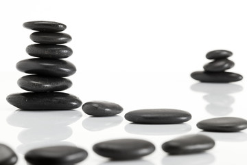 Wet smooth polished hot massage black stones