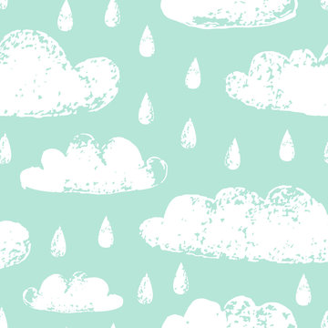White clouds and rain grunge prints on blue sky seamless pattern