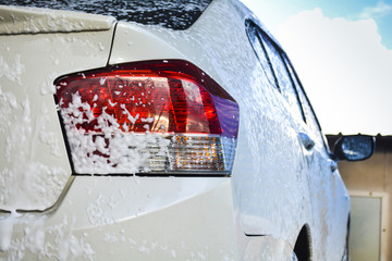 car getting a wash with soap
