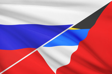 Series of ruffled flags. Russia and Antigua and Barbuda.