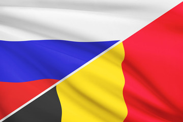 Series of ruffled flags. Russia and Belgium.