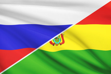 Series of ruffled flags. Russia and Bolivia.