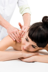 Obraz na płótnie Canvas Relaxed female model getting a massage.