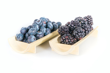 Fresh sweet blueberries and blackberries