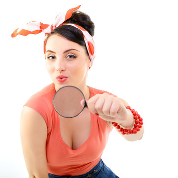 Pinup girl with magnifying glass, portrait of young happy sexy w