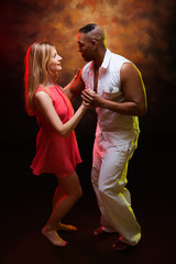 Young couple dances Caribbean Salsa