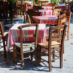 Tables and chairs in a traditional Greek tavern