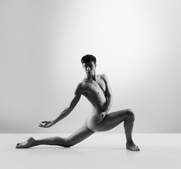 Sporty and athletic ballet dance. Black and white image.