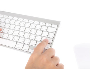 Fototapeta na wymiar Closeup of business woman hand typing on laptop keyboard with mo