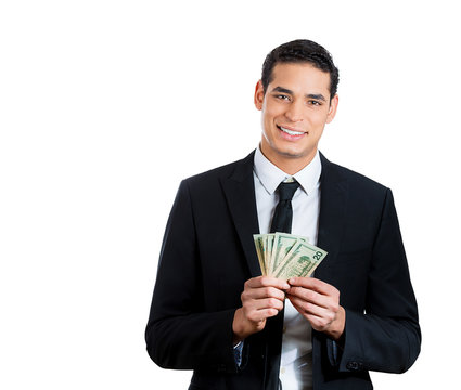 Happy guy holding dollar bills cash on white background 
