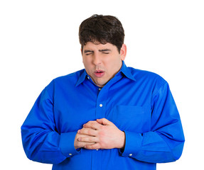 Young man having sudden chest pain