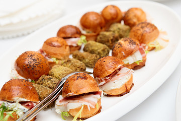 Appetizers with bacon and small buns
