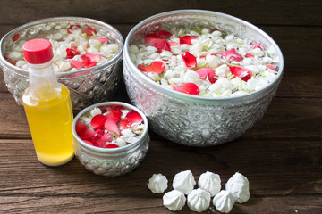 Fototapeta na wymiar Water in bowl mixed with perfume for Songkran festival