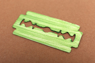 Razor blade on color background