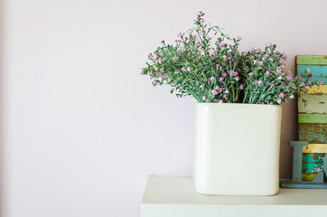 Interior plastic flower in vase