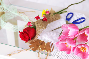 Working place of florist. On light background. Conceptual photo