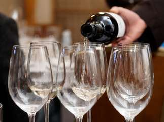 Pouring wine in glass