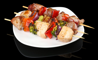 Pork kebab on black background
