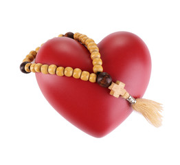 Heart with rosary beads isolated on white