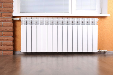 Obraz na płótnie Canvas Heating radiator in room