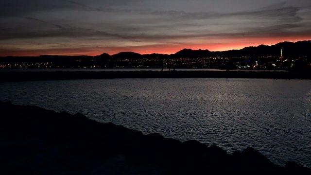 Sunset at central beach of Eilat - famous Israeli resort city