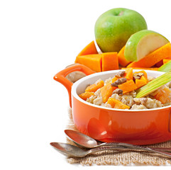Oatmeal with pumpkin, apples, nuts and honey