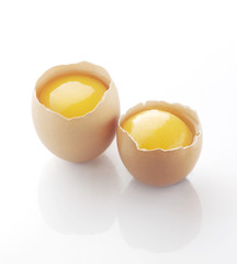 Broken egg isolated on white background
