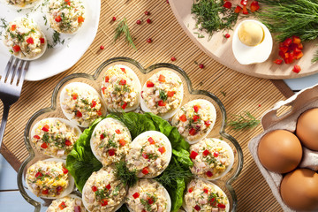 stuffed eggs with ham, red pepper and dill