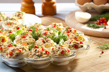 stuffed eggs with ham, red pepper and dill