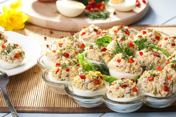 stuffed eggs with ham, red pepper and dill