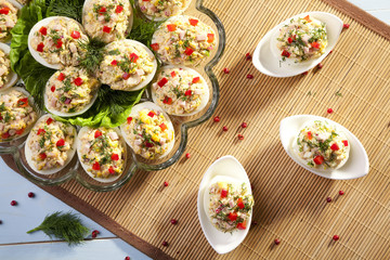 stuffed eggs with ham, red pepper and dill
