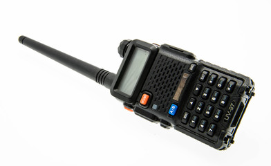Used Portable UHF radio transceiver isolated on white background © naughtynut