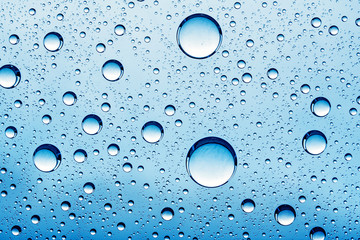 Abstract backgrounds with oil drops over glass