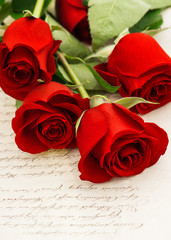 red roses and old love letters. retro style