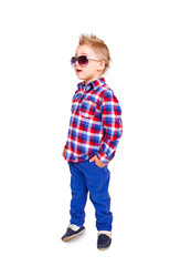 Cool little boy posing on a white background