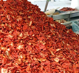 dried red ripe tomatoes for sale at vegetable market