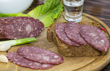sausage on a wooden plate in a restaurant
