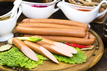 sausage on a wooden plate in a restaurant