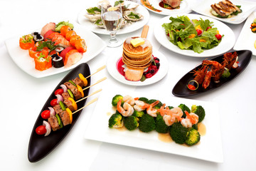 Mixed berry pancake on white plate.