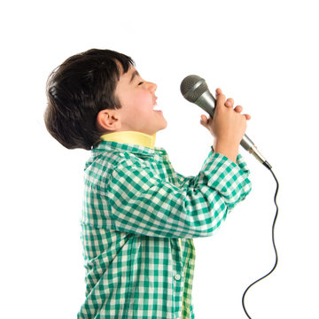 Kid Singing Over White Background